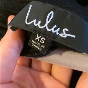 BLACK FLARE ARM BODY SUIT